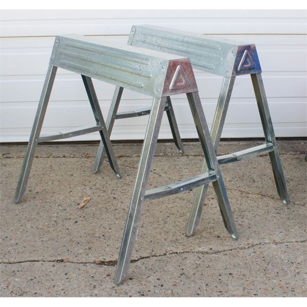 TWO FOLDING GALVINIZED SAW HORSES 