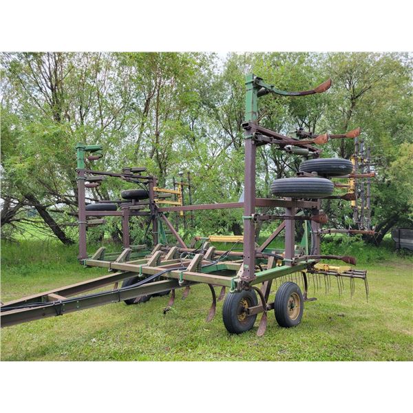 JD 1610 Deep tillage, approx. 27 ft c/w Degelman 3-bar tine harrows, 2 year-old tires, all wheel bea