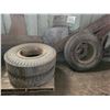 Image 1 : (So much each x 5) 4- 10.00-20 tires c/w split rims c/w 1- Dayton tire & rim
