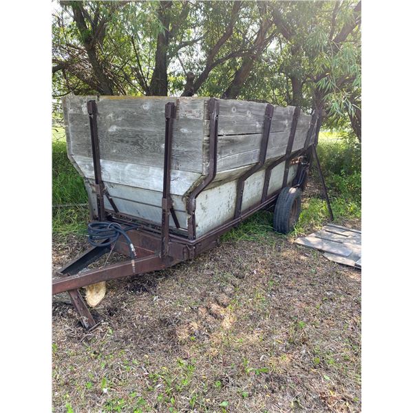 Old converted manure spreader c/w hyd. Drive c/e fence posts & barb wire