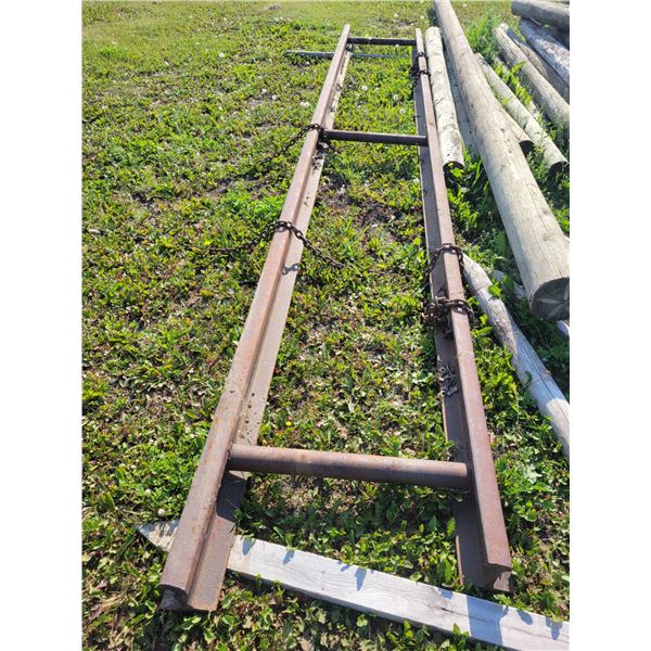 Twin railroad beam drag, approx. 17 ft