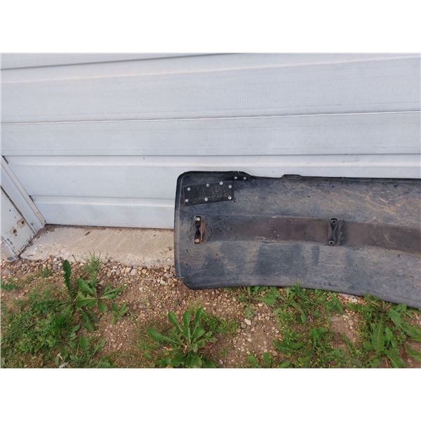 Repaired front tractor fender