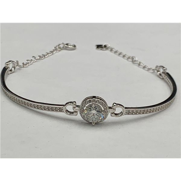 1.10 CT GRA CERTIFIED MOISSANITE VVS SET IN CENTER WITH 86 ROUND CUT CUBIC ZIRCONIUM SET IN A ROUND 