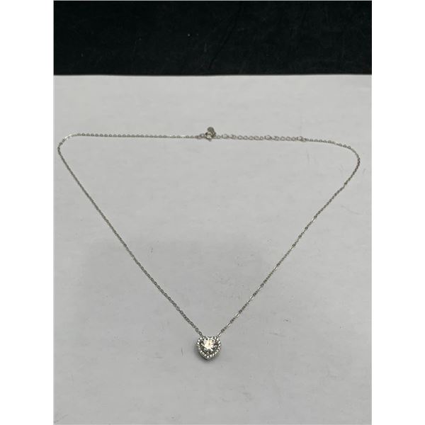 1.20 CT GRA CERTIFIED MOISSANITE VVS D COLOR SET IN CENTER SURROUNDED BY A HEART SHAPED HALO WITH 22