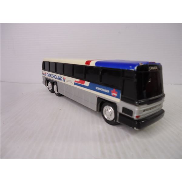 Greyhound Bus Coin Bank and Tin North Pole Delivery Truck