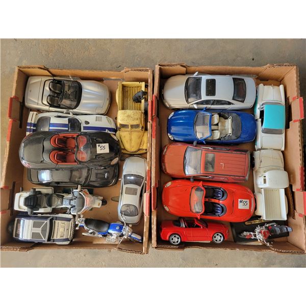 2 boxes of toy cars, trucks, and motorcycles.