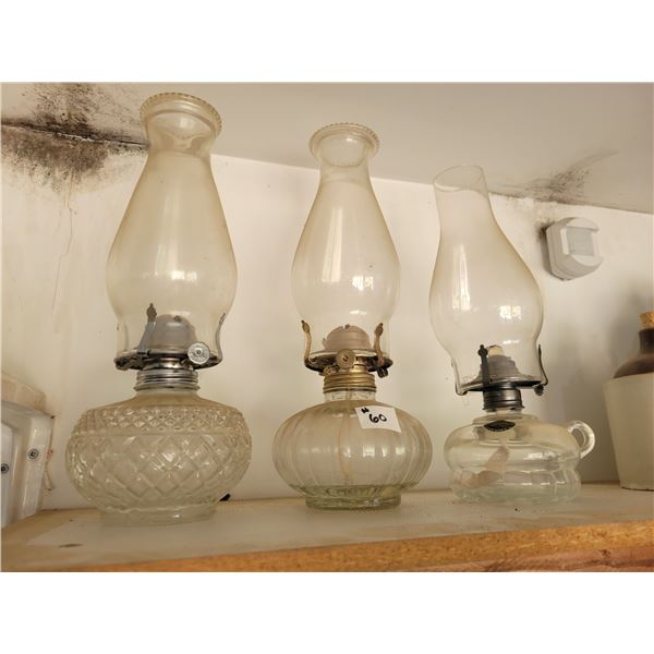 1 finger lamp, and 2 oil lamps. C/w globes.