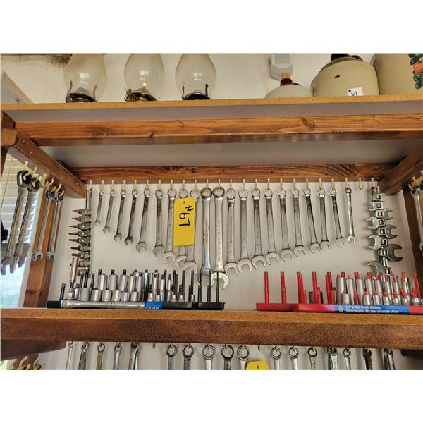 Quantity of combination wrenches, and sockets.