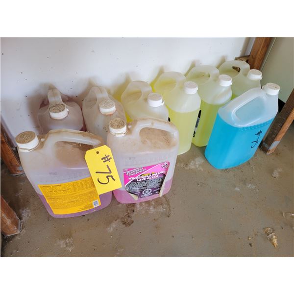 Approx 9 jugs of windshield cleaner.
