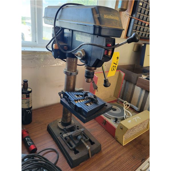 Mastercraft drill press. Complete with small vice, and drill bits.  And Aron blue bench vice.