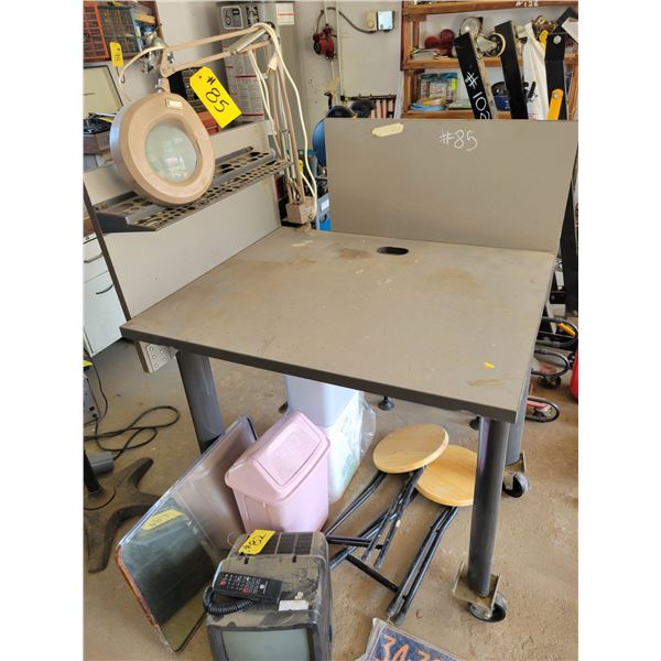 Rolling table. Complete with magnifying glass.