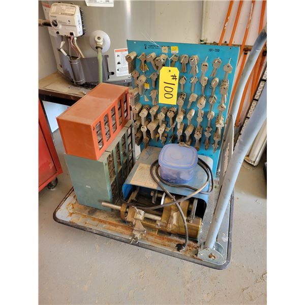 Old key cutting machine. Complete with keys.