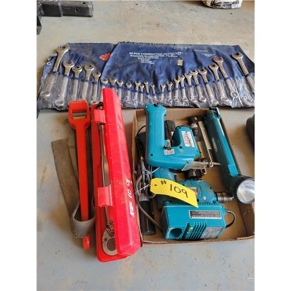 Various Makita tools, torque wrench, and comb. Wrenches.