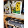 Image 4 : Various oils, funnels, grease guns, leak stop, air charging cans, grease.