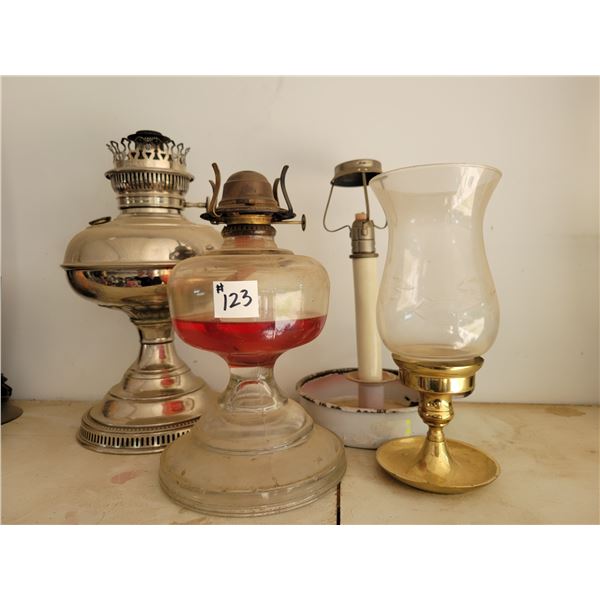 4 various old oil lamps.