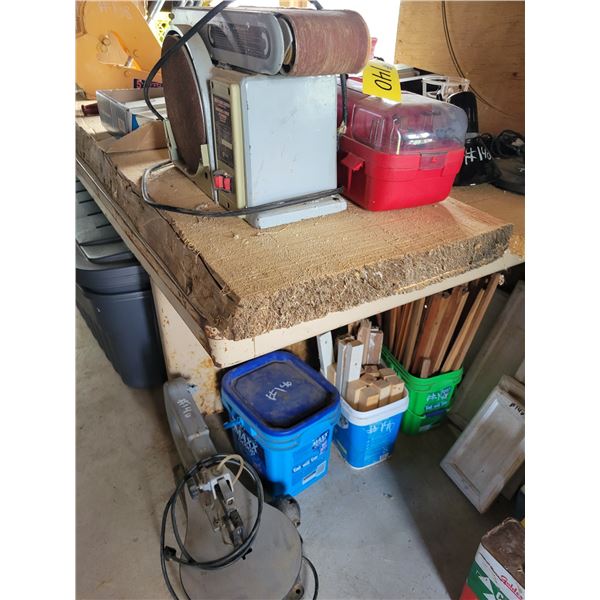 Belt & disc sander , craftsman grinder, and 16 inch variable scroll saw plus misc. wood in corner.
