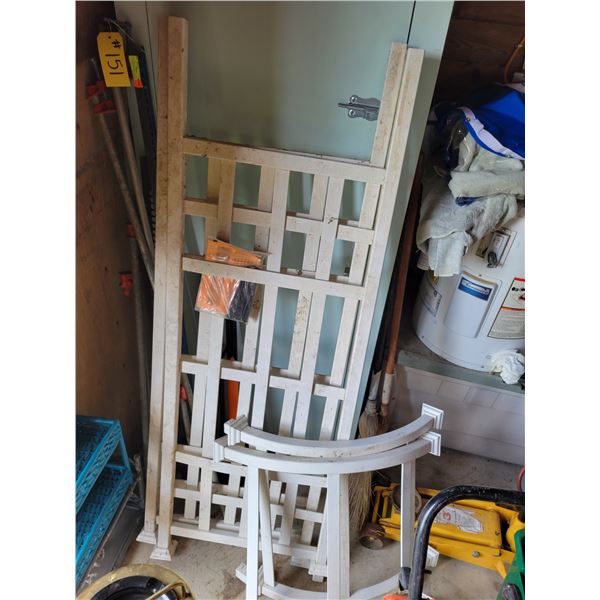 Wood shelf unit, 2 old bottles, blue stand and grey wood sections.