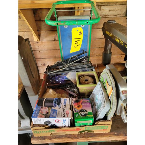 Zap guard, miracle grow, clay stones, and green stand.