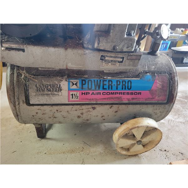 Power pro 1.5hp air compressor with yellow hose.