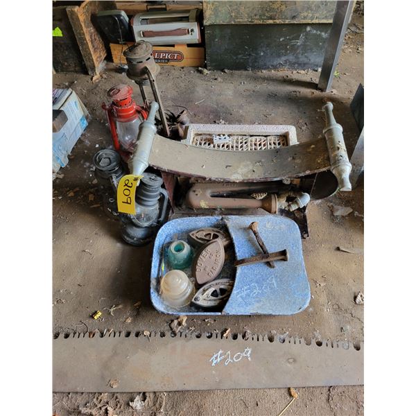 Saw, oil lamps, ceramic fireplace