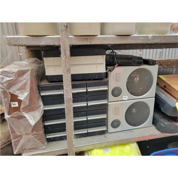 Paper cutters, saddle bags, old irons, tape cassette storage container & speakers