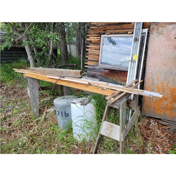 Misc. wood, saw horses, 1/2 barrel & some iron