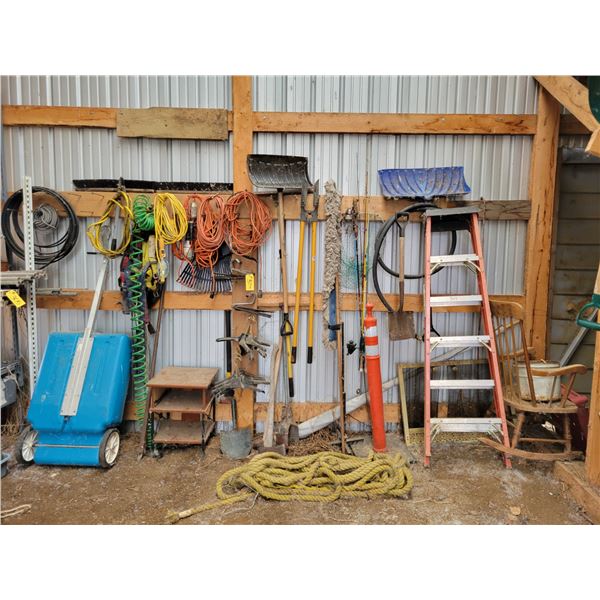 1- Lot of tools, cords, chair etc. against the wall