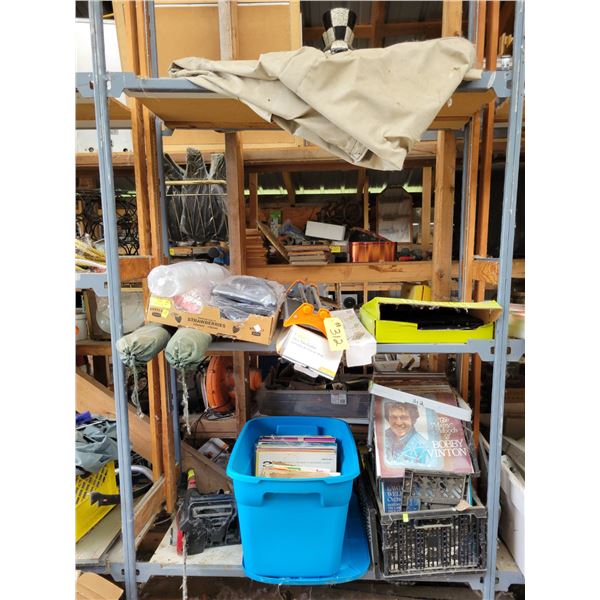 Qty of records, chain saw & misc. items on shelf