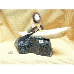 13" whale bone kayaker by Michael Scott mounted on Alaskan jade (2)