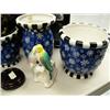 Image 2 : Lot of: small display case, three blue pots, walking, talking dog, ceramic egg on stand, two love bi