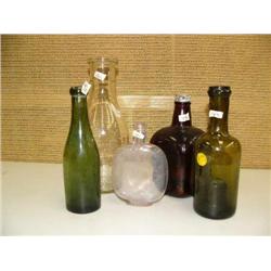 Lot of: pumpkin seen flask, milk bottle and 3 old bottles (194)