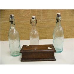 3 porcelain top soda bottles and small oak box (194)