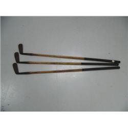 Lot of 3 wood handle golf clubs (194)