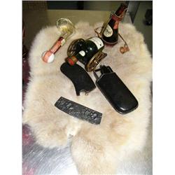 Silver comb, pair of old eyeglasses, magnifying glass, rabbit skin and collector bottles (189)