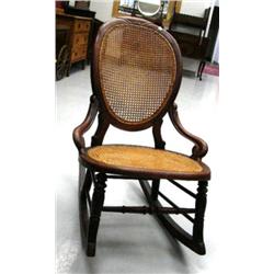 Extremely rare American balloon back Victorian walnut, cane seated rocker (2)