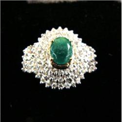 Emerald and diamond lady's ring, 14 K yellow gold, emerald: oval, faceted, approx. 1 carat, semi-tra
