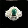 Image 1 : Emerald and diamond lady's ring, 14 K yellow gold, emerald: oval, faceted, approx. 1 carat, semi-tra