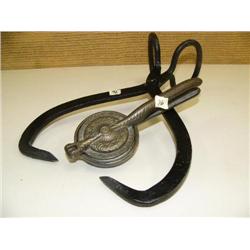 Pair of ice tongs and very ornate wood pottery and metal lemon squeezer, very rare (194)