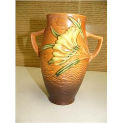 Approx. 6" orange Roseville vase marked 117-6 (199)