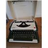 Vintage 1970's Olympia Traveler typewriter with hard white case