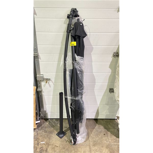 PATIO UMBRELLA (UNKNOWN CONDITION, MAY BE MISSING PIECES)