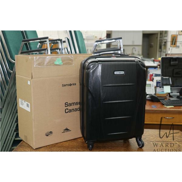 Brand new Samsonite Windfield NXT carry-on bag with brushed back finish, in original shipper