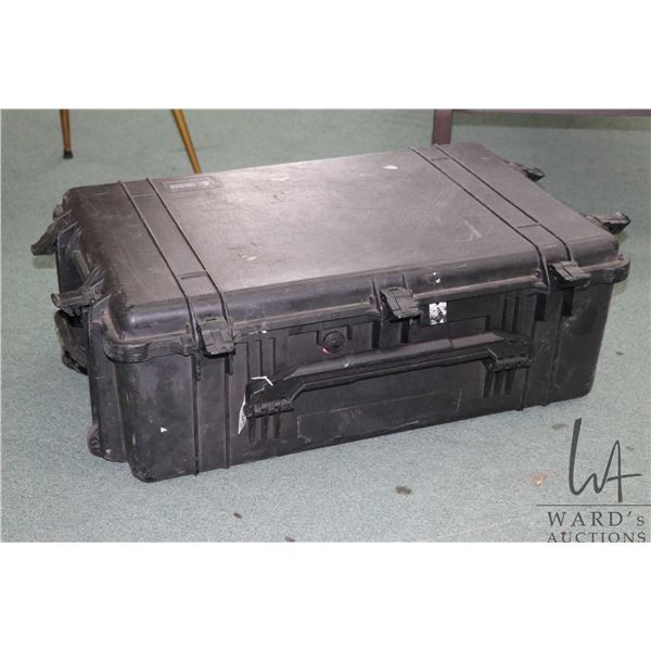 Pelican model 1650 hard case with no liner, 11" H X 32" W X 21" D. NOTE: This item may be expensive 