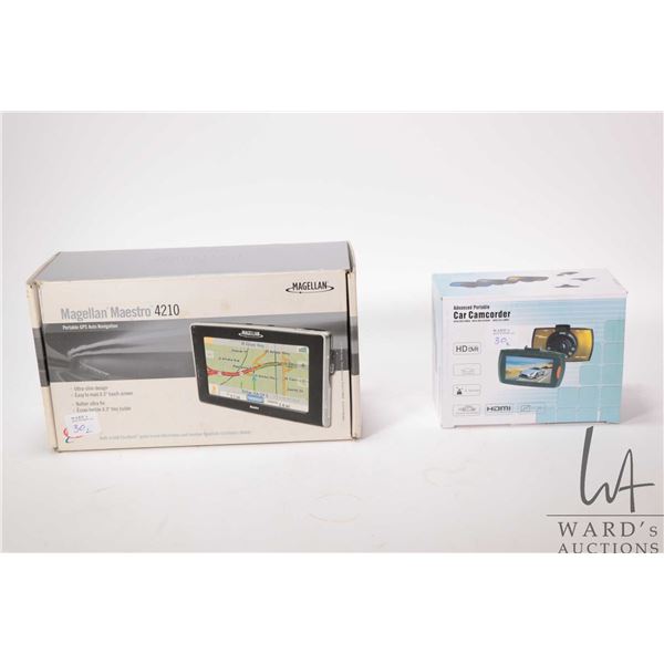 Magellan Maestro GPS with original packaging and accessories and a Advance Portable car camcorder wi