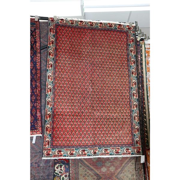 100% handmade Iranian wool carpet "Mir" with overall geometric pattern, red background and highlight