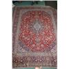 Image 1 : 100% hand made Iranian "Kashan" carpet with center medallion, multiple boarders, red background and 