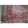 Image 2 : 100% hand made Iranian "Kashan" carpet with center medallion, multiple boarders, red background and 