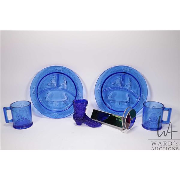 Collection of children's vintage cobalt glass including nursery rhyme divided plates and cups, boot 