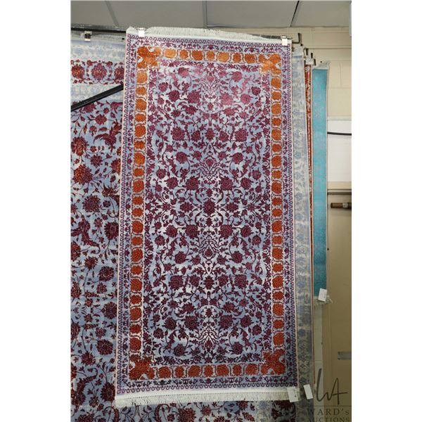 Premium Collection Sizan Carpet poly/ cotton blend carpet with blue background, overall floral desig