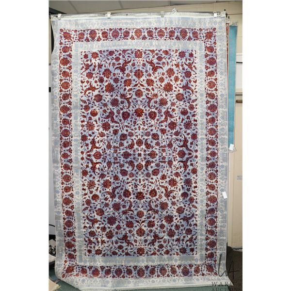 Premium Collection Sizan Carpet poly/ cotton blend carpet with blue background and floral pattern wi